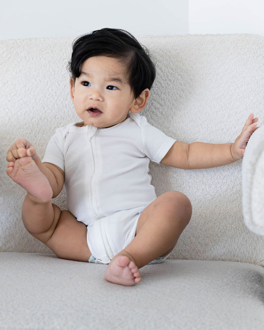 Short Sleeve Zipper Bodysuit in Pearl, 9-12M - Dreambelles